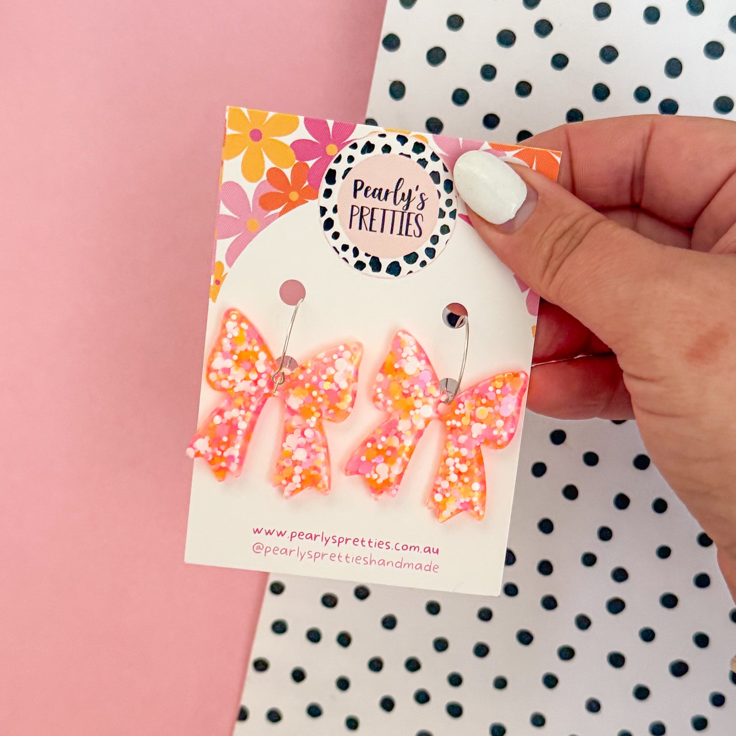 Bonnie Bow dangle hoop earrings- Orange and pink sparkle