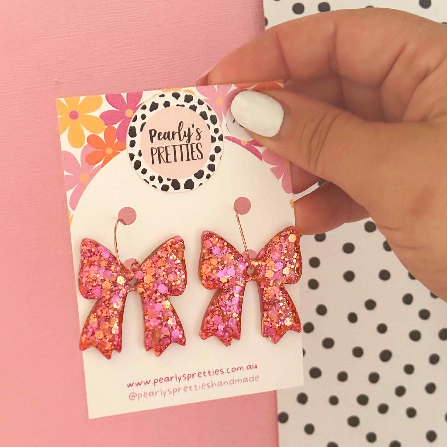 Bonnie Bow dangle hoop earrings- pink and orange glitter