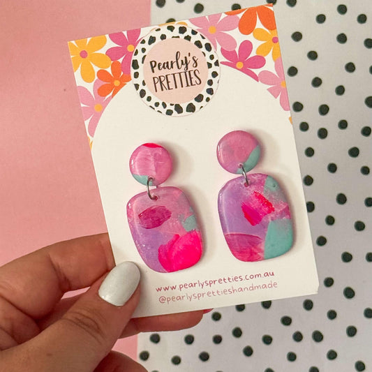 Resin coated dangle earrings 065